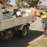COuncil employee collecting bulky goods for disposal