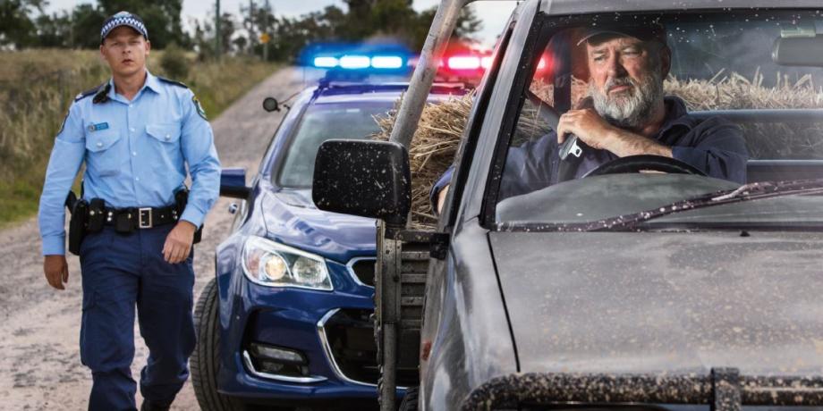 Police Officer checking seatbelt safety