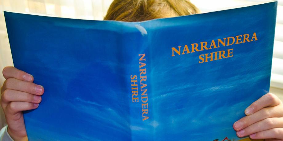 Boy reading Narrandera Shire
