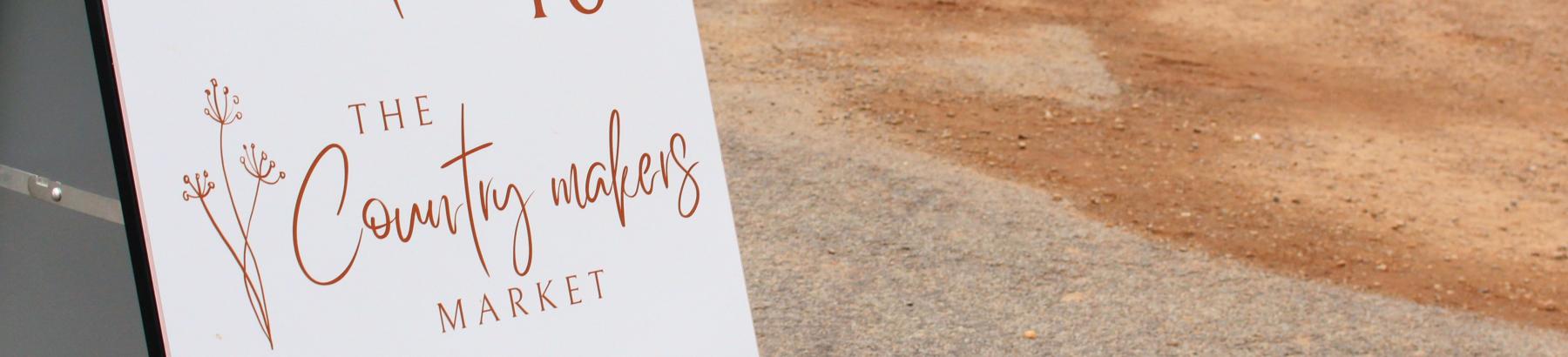 The Country Makers Market entry sign