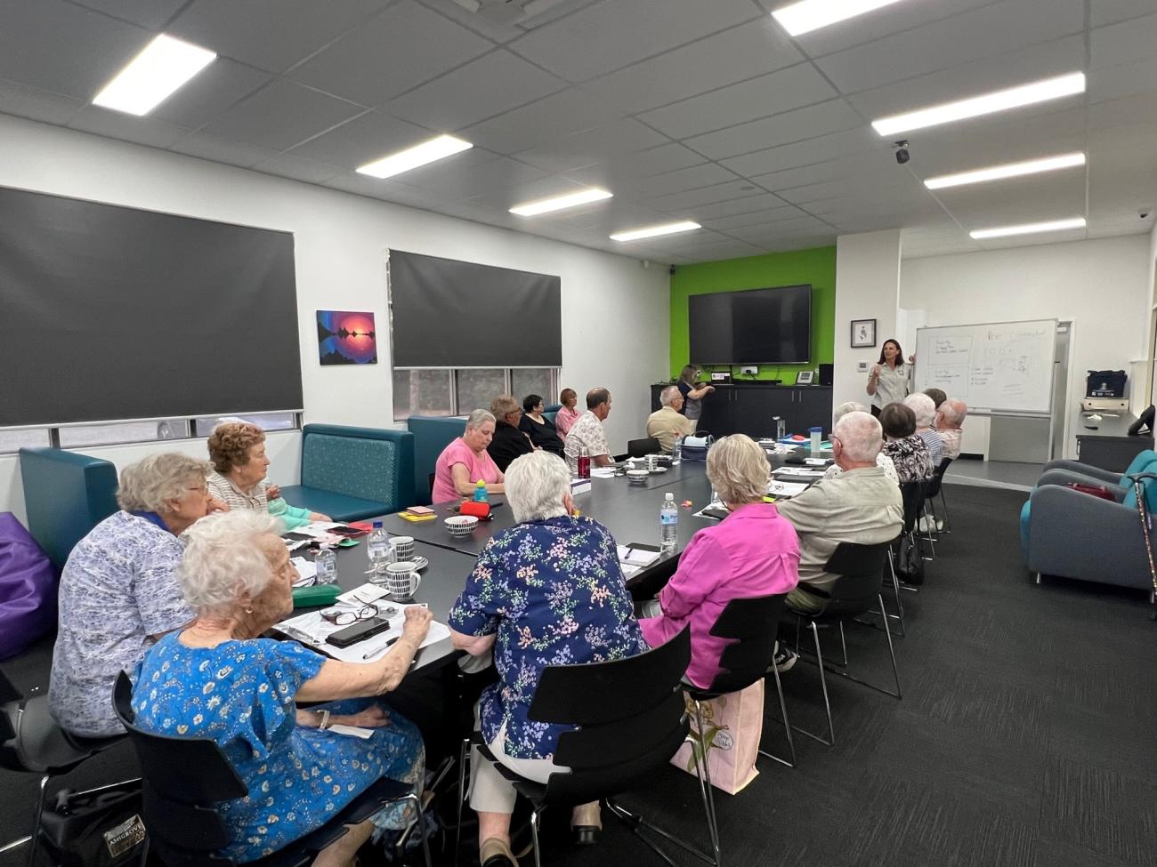 Group of residents sitting at the Narrandera Shire Library at a Tec Exec workshop