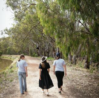 Three women walking through the Narrandera Flora and Fauna reserve