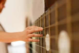 Did you know the Big Guitar is playable? Head into the Destination and Discovery Hub for a strum
