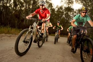 Group cycling through Narrandera Common
